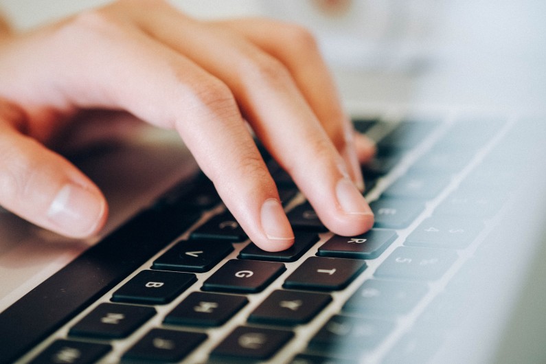 hand-laptop-lo.jpg